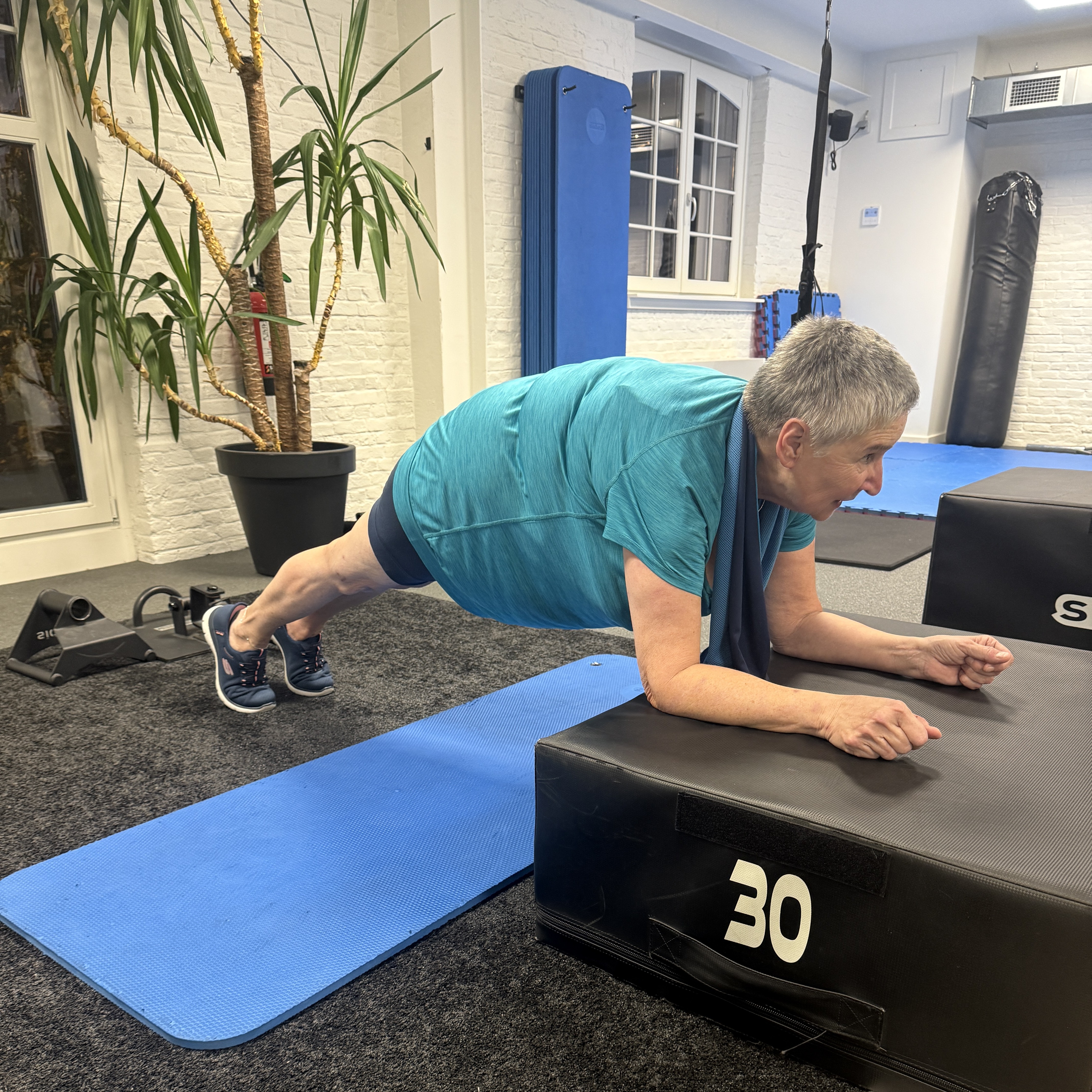 afbeelding van een vrouw in een sportschool